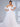 Vestido de novia de tul con corte campestre y hombros descubiertos